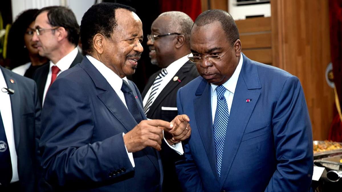 Le chef de l'Etat Paul Biya et le ministre des Finances du Cameroun, Louis Paul Motaze